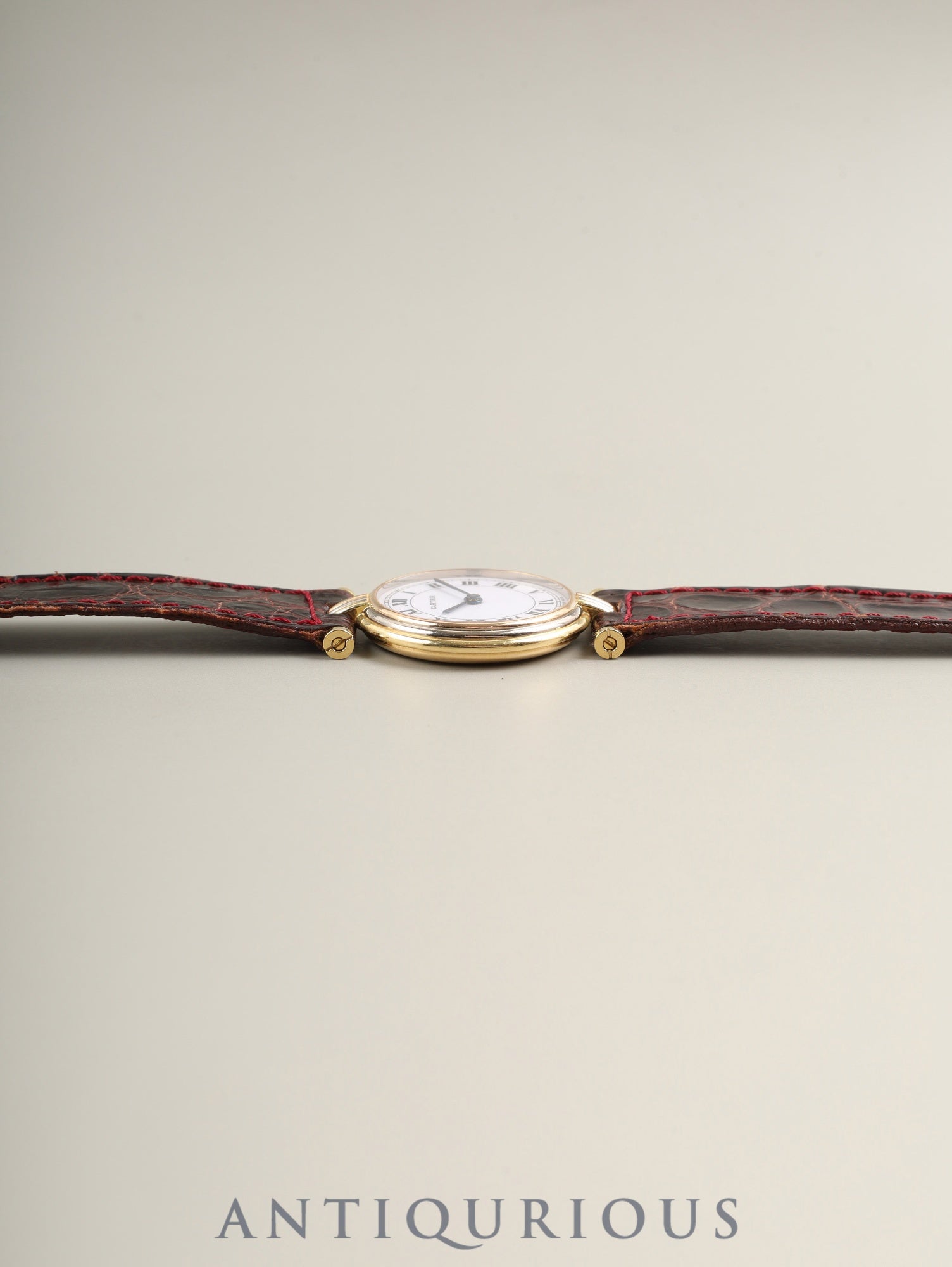 Cartier Vendôme Trinity VLC SM 81004 Quartz Caliber 690 750 with genuine leather strap and genuine buckle (GP). White Roman dial with genuine strap. (Unused) Overhauled.