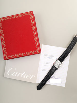 Cartier Must Tank MM W1016530 / 2416 Quartz Caliber 057 SV925 with genuine leather strap and genuine D-buckle (SS). Silver Roman dial (SWISS MADE / Christmas limited edition). Circa 2000. Includes booklet and warranty card. Overhauled.
