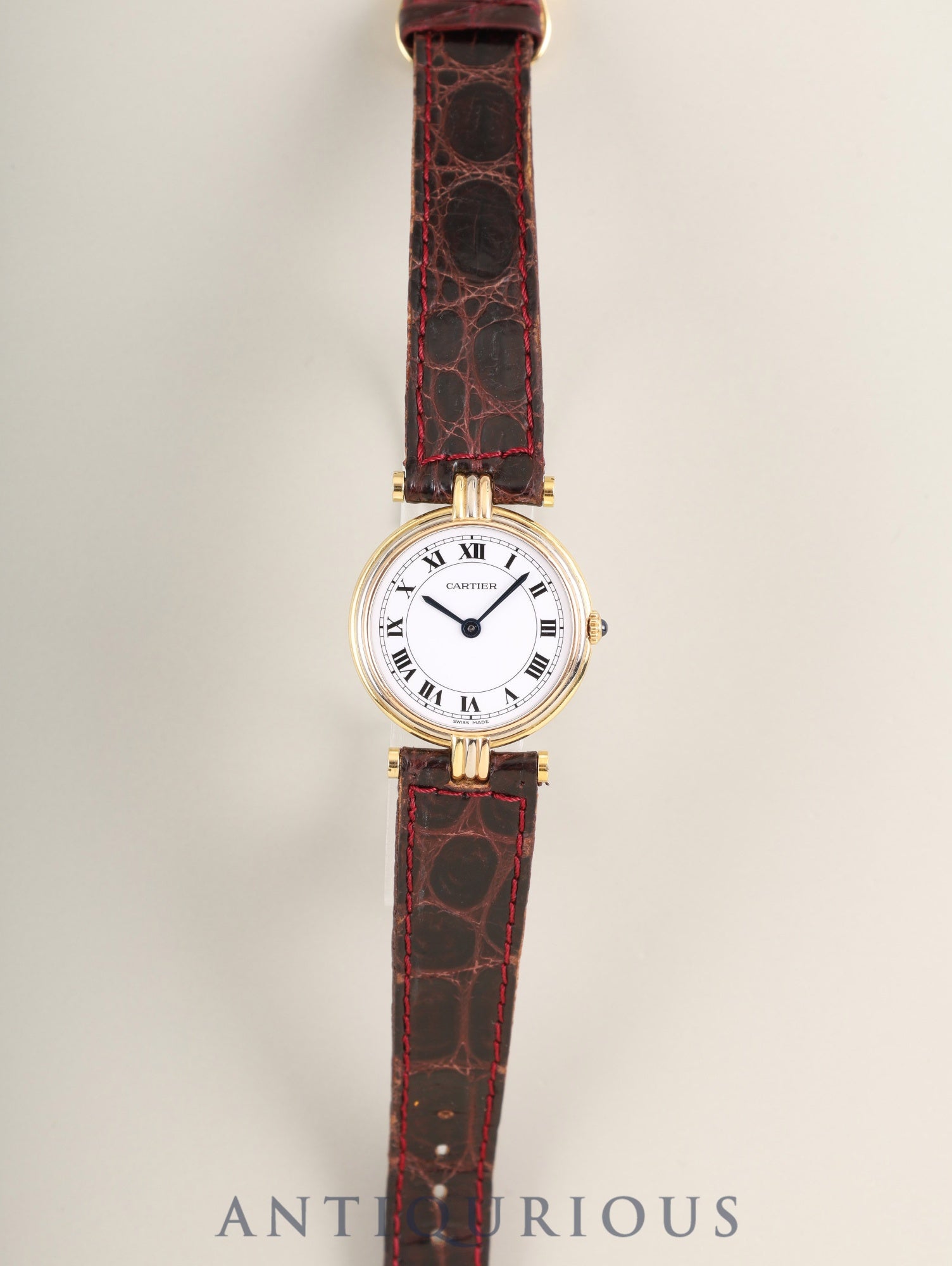 Cartier Vendôme Trinity VLC SM 81004 Quartz Caliber 690 750 with genuine leather strap and genuine buckle (GP). White Roman dial with genuine strap. (Unused) Overhauled.