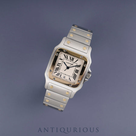 Cartier Santos Galbee LM W20011C4 / 1566 Quartz Stainless Steel/Yellow Gold with White Roman Dial. Completely serviced at a Cartier boutique.