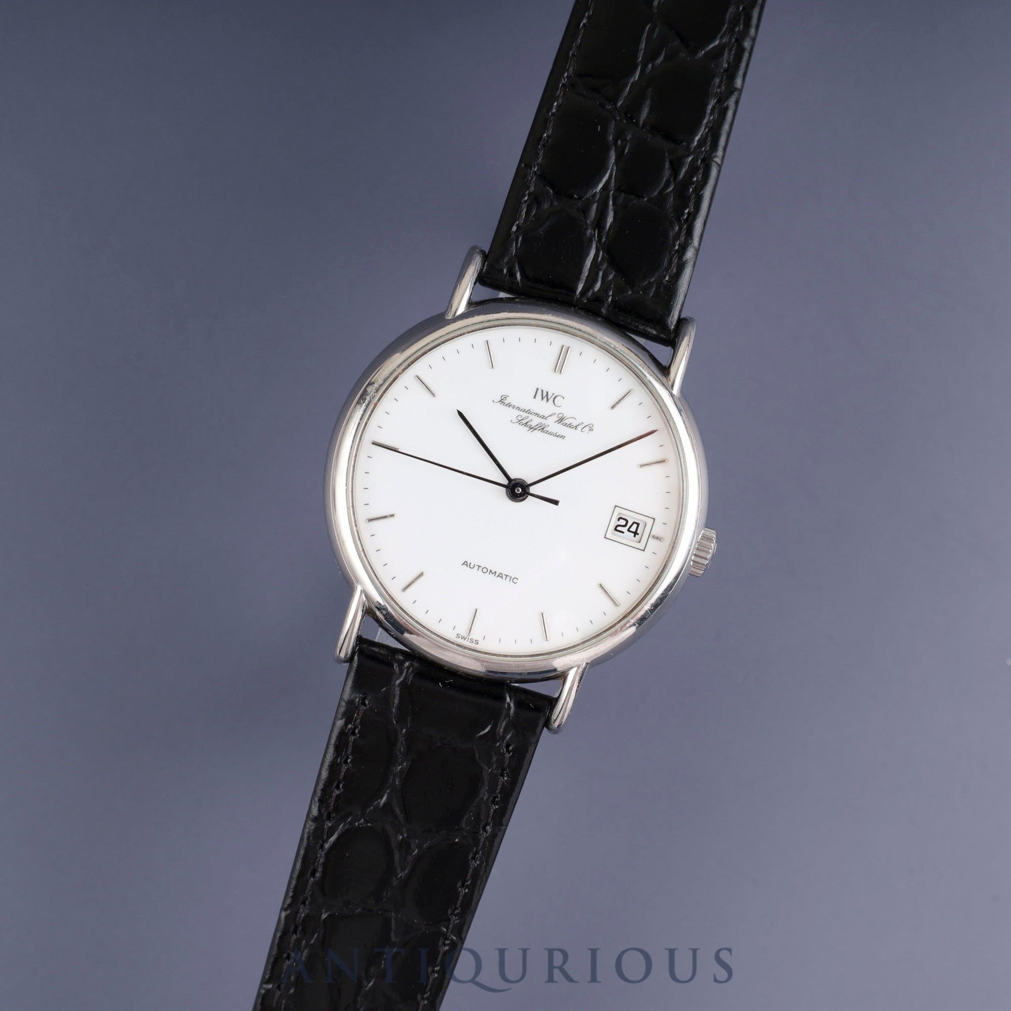Iwc手巻き時計 ホワイト文字盤　アンティーク IWC オールドインター 筆記体ロゴ 名機 Cal.89 手巻きドルフィン