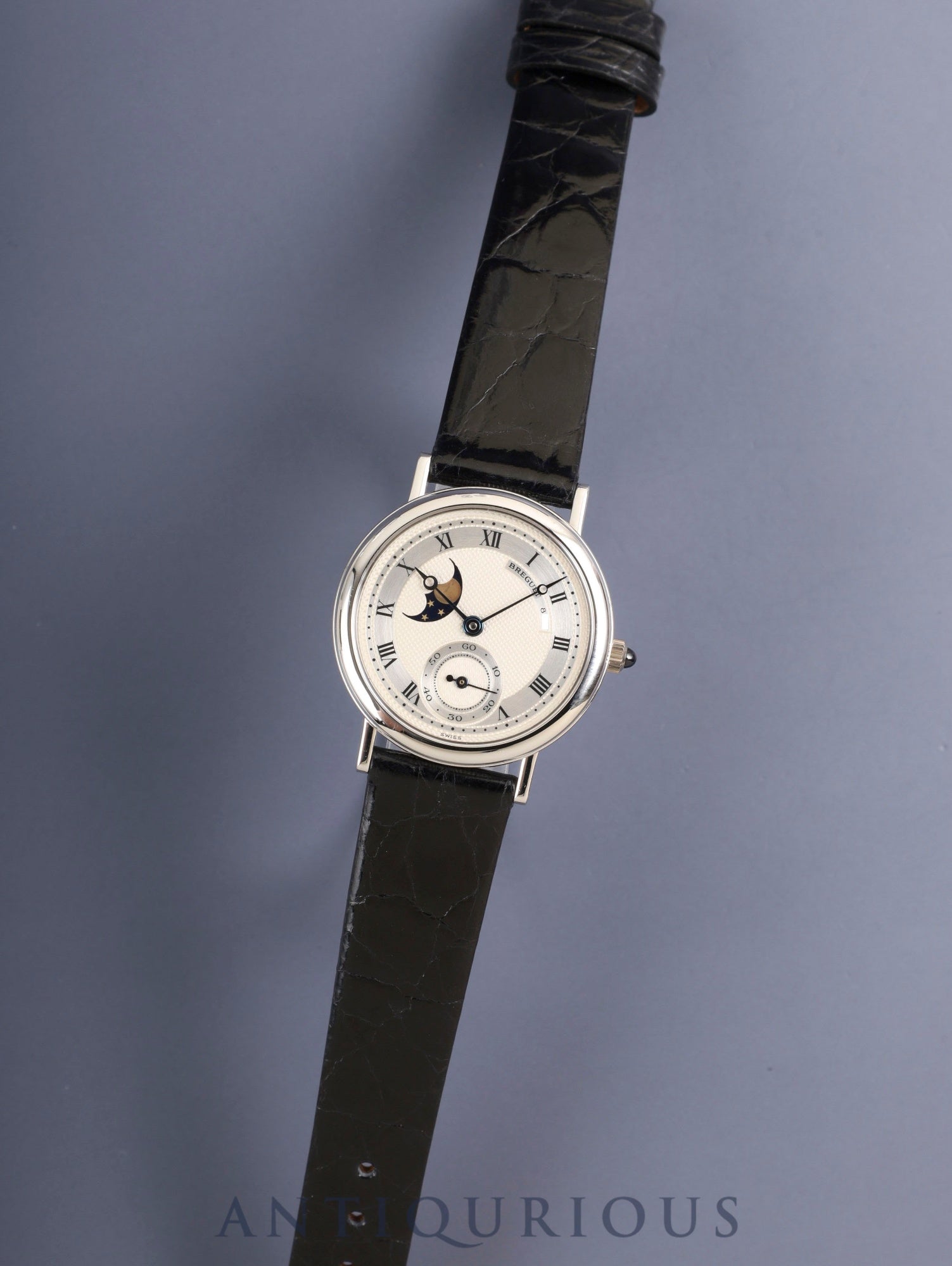 Breguet Crackle Moonphase 3280BB, manual winding, Cal. 818/4, 750WG, leather strap, original pin buckle (750WG), silver Roman numeral dial, box, recently overhauled.